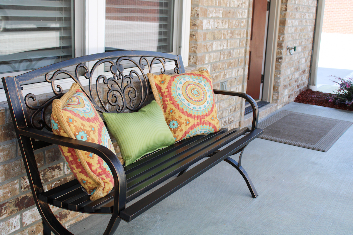 Private covered porch at a Pinewood Place townhome