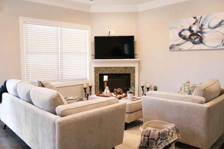 Living room with fireplace in a Pinewood Place townhome