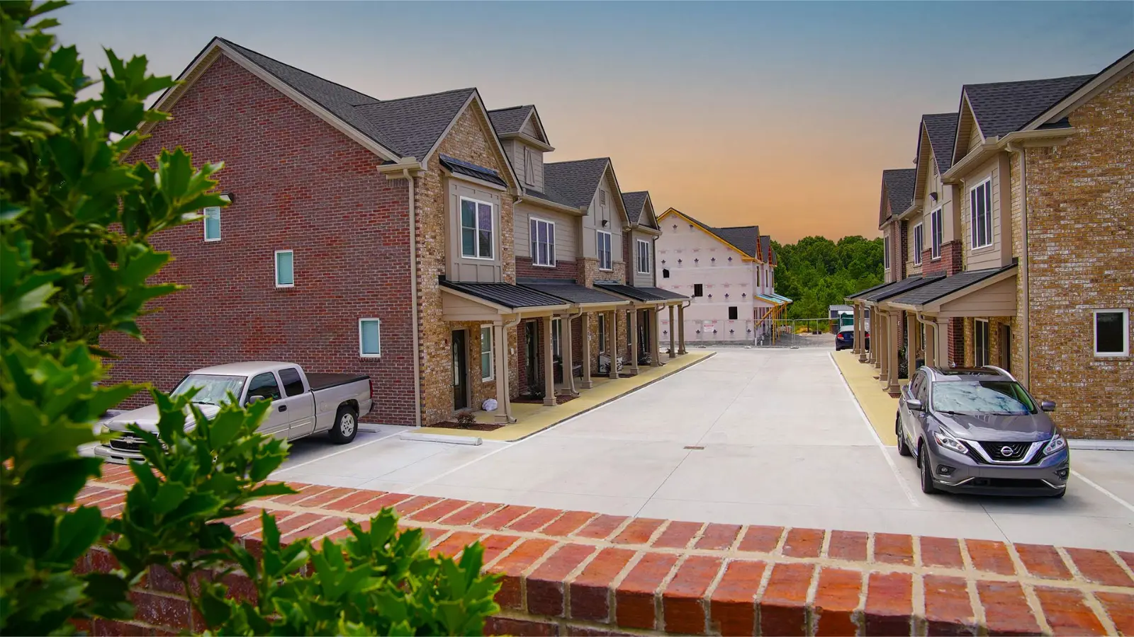 Pinewood Place Townhomes exterior at dusk in White Bluff, TN